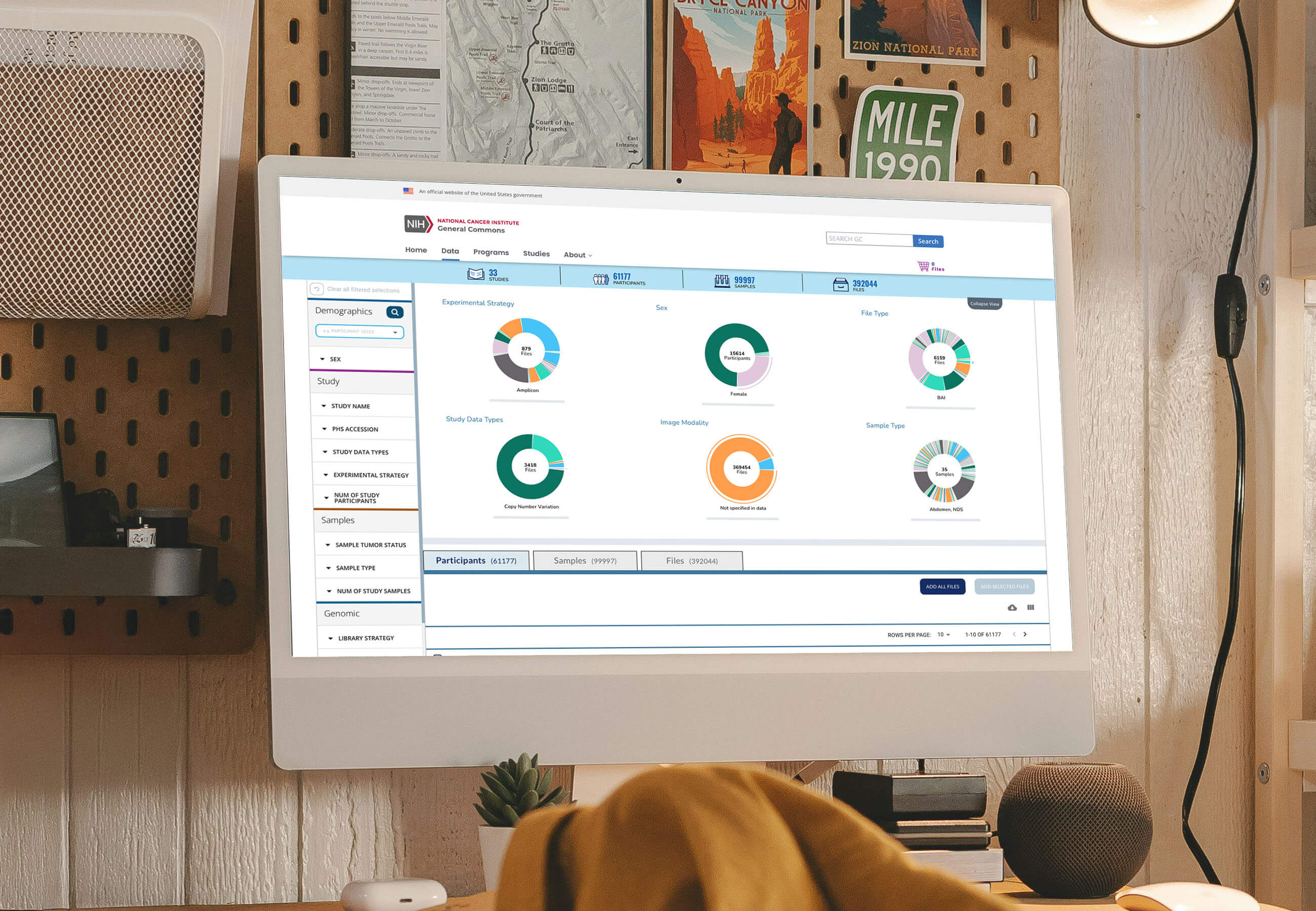 Imac on a decorated desk displaying a national cancer institute website